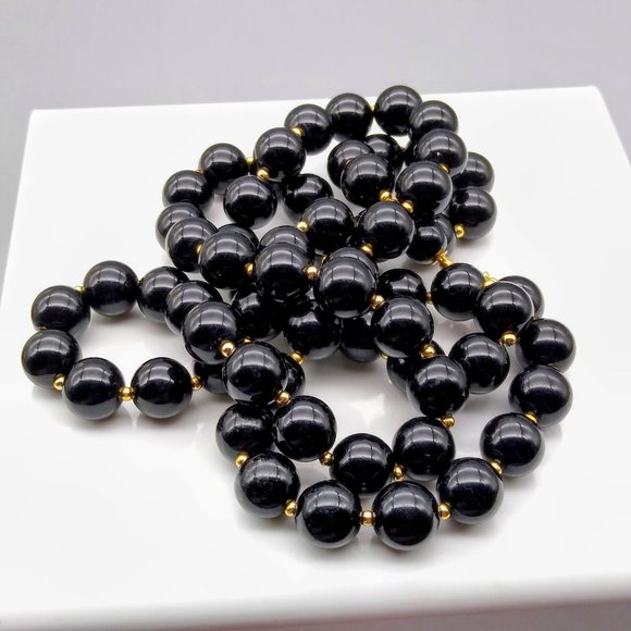 Chic Vintage Black Lucite Beads Necklace with Gold Tone Spacers and Hidden Hand - Picture 2 of 4